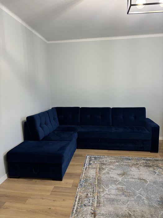 Naroznik niebieski z funkcja spania i pojemnikiem na posciel