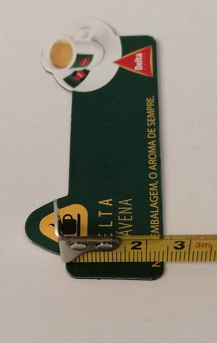 Íman de frigorífico com publicidade da Delta Cafés