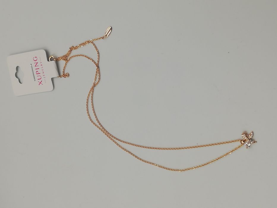 Celebrytka pozłacana 14 karatowym złotem Xuping cyrkoniowa kokardka