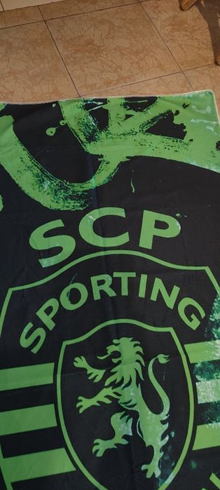 Toalha alusiva ao Sporting