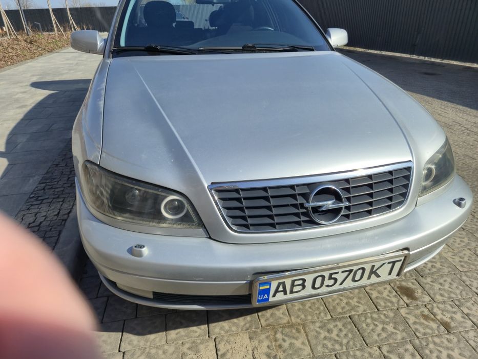 Opel Omega B.    —    2,5TD   M57.    
Про