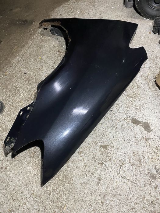 Błotnik przód prawy VW Touran lift 06-10r czarny