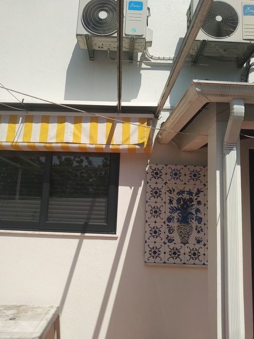 Pérgola de encostar com tecido
