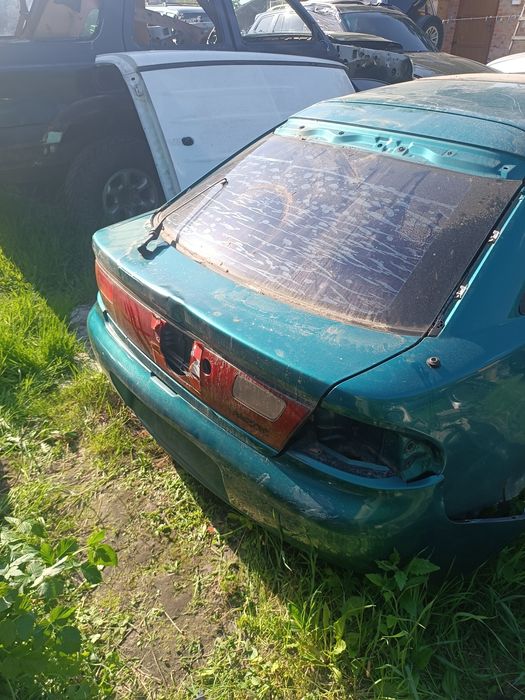 Задній бампер Mazda 323 BA