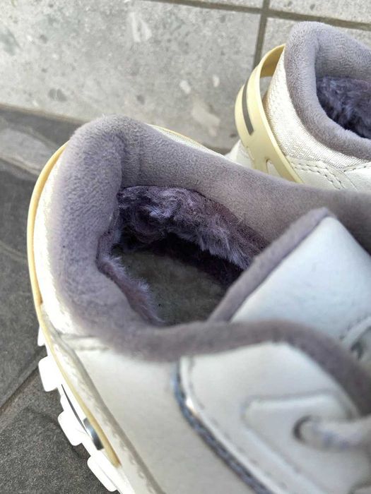 Зимові утеплені кросівки Xtep