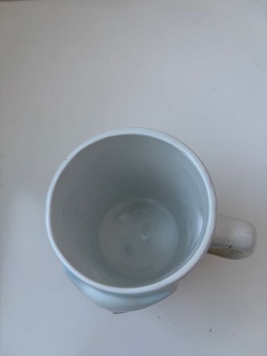This mug is a retro ceramic cat-shaped mug.446601482784614403