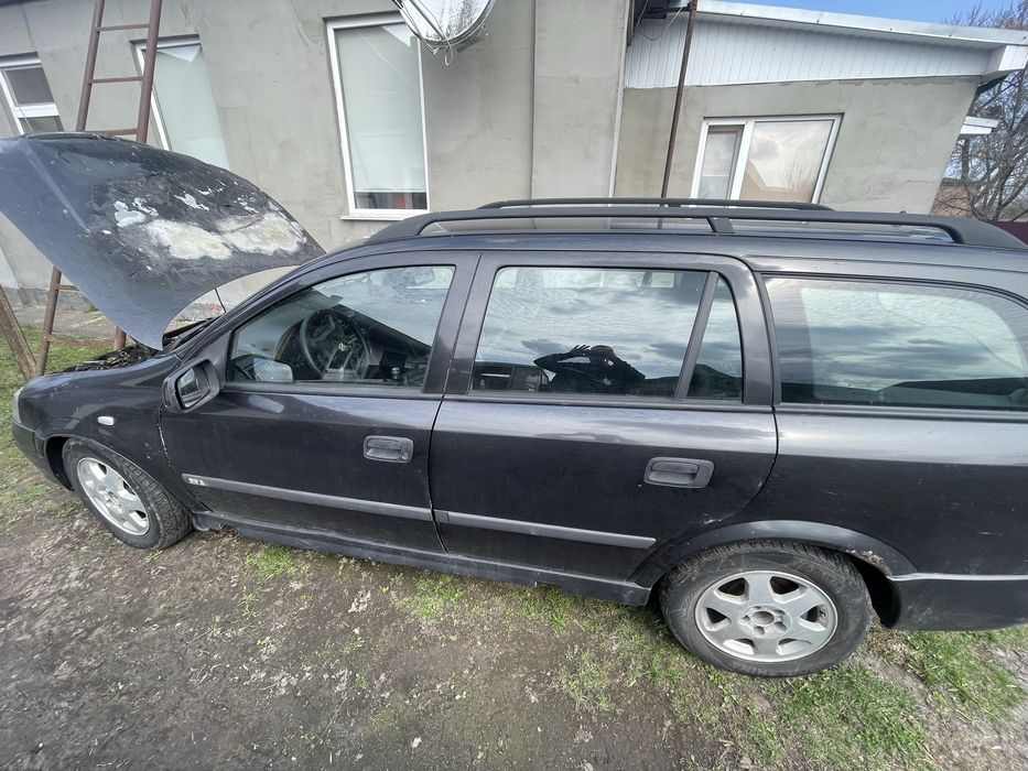 Опель astra G 100