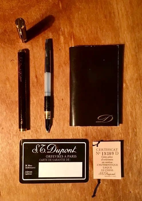 S.T. DUPONT - caneta - acb. ouro e laca da China com pó de ouro