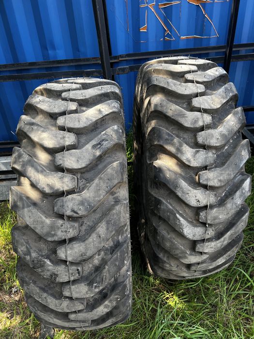 Dwie nowe opony 15.5-25 ładowarka