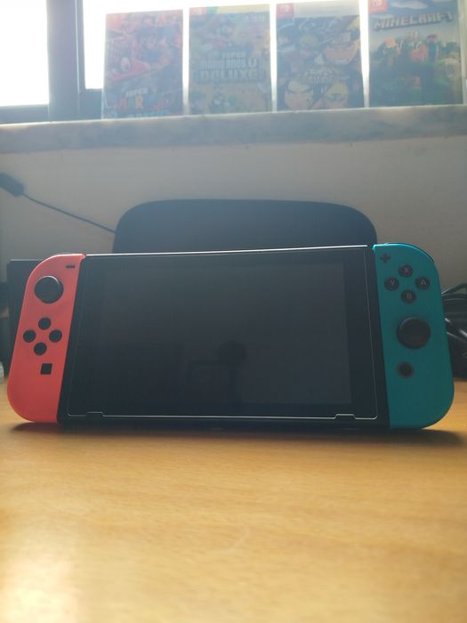 Nintendo Switch Complete with 4 Games and Carrying Case64551764677635124