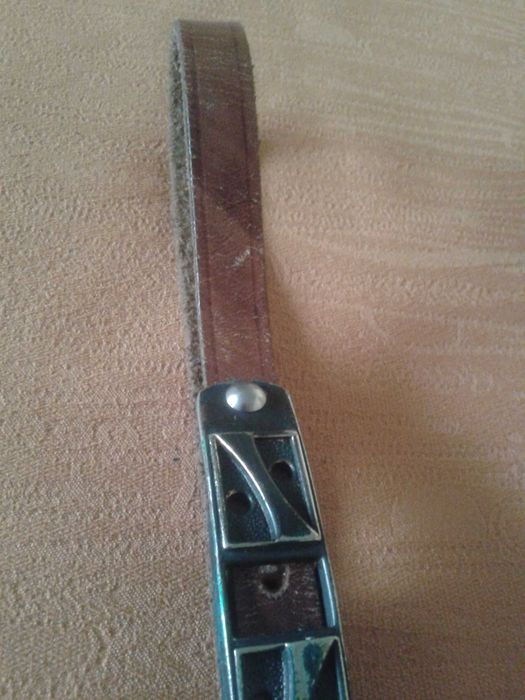 Pasek damski ze skóry licowej,brązowy.Długość 98cm