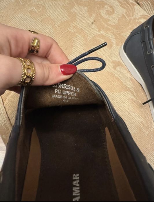 Sapatos de vela da quebramar