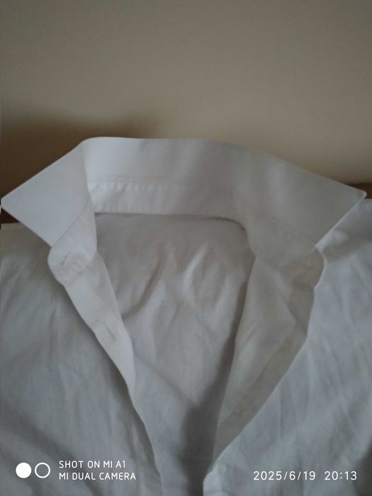 Biała bluzka dla dziewczynki na wzrost 140/146