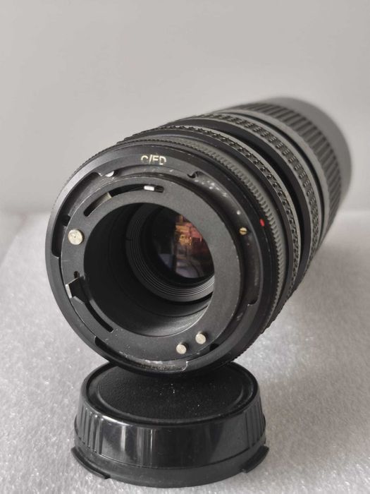 lente Tokina RMC 70–260mm f/4.5 FD lente zoom + bolsa + filtro Vivitar