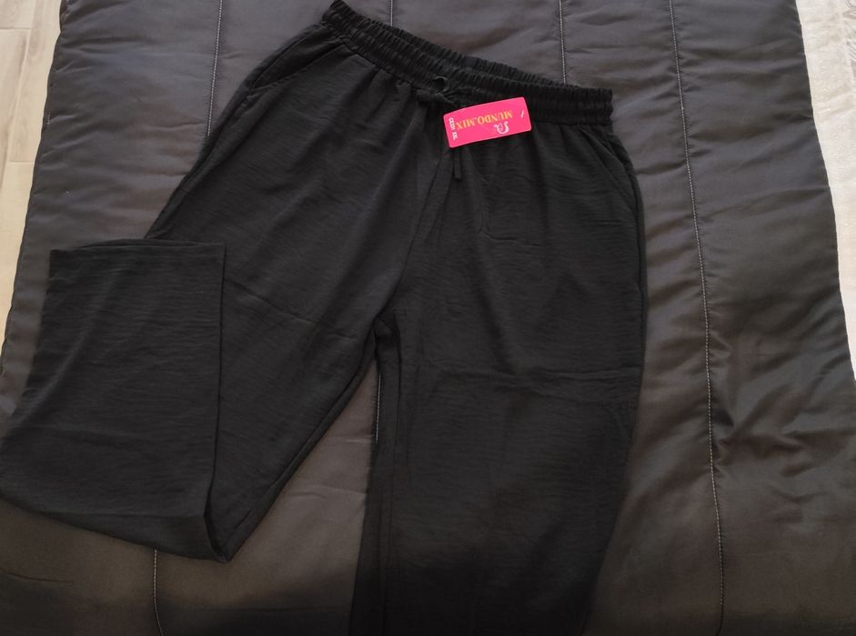 Calças pretas fluídas