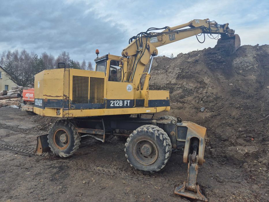 CAT 212 koparka kołowa obrotowa