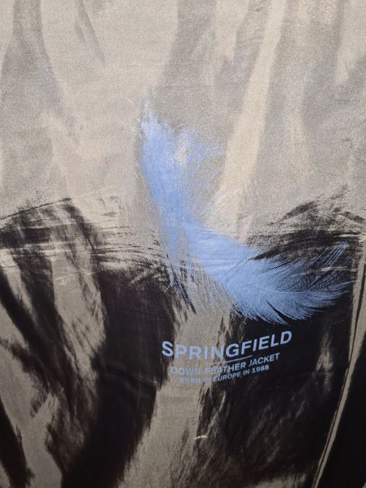 Casaco de penas de homem