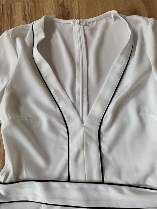 Biały elegancki kombinezon 34