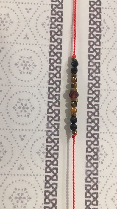 Bastet bransoletka Lew znak zodiaku granat jedwab