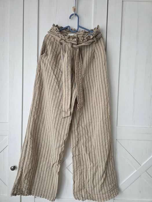 Lekkie spodnie paperbag H&M w paski, wiskoza i len, rozm. 34 (XS