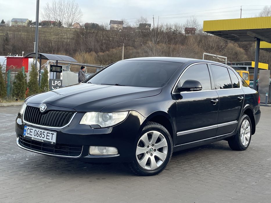 Суперб коробка автомат 2010 рік