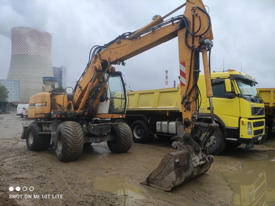 Usługi koparką obrotową i wywrotką transport koparko ładowarka