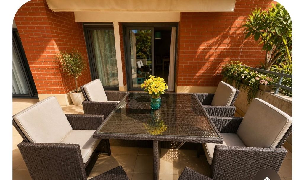 Mesa e cadeiras com repousa pés de Jardim