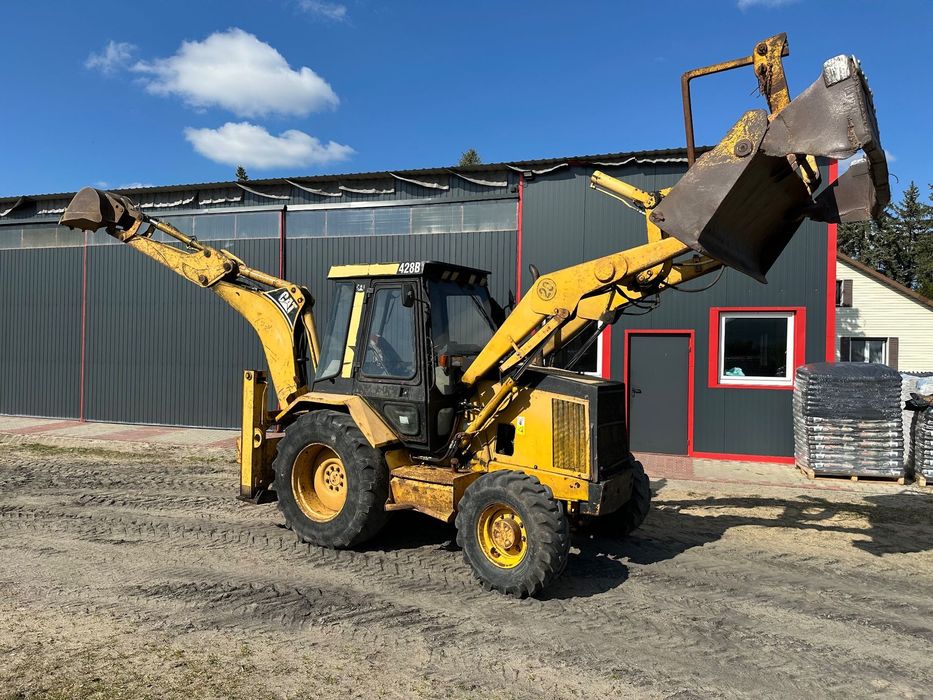 Caterpillar 428B ramię typu Banan  CAT 4x4 Koparko Ładowarka Koparka widły do palet Brutto Faktura VAT