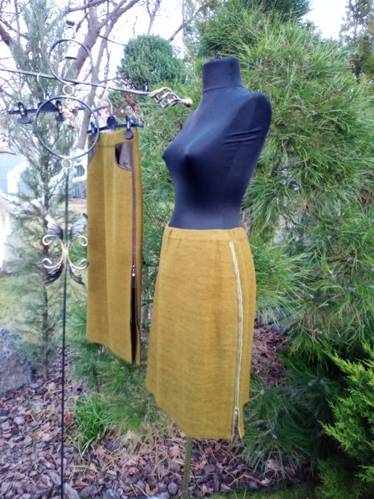 новый элегантный Польский костюм52-54р.