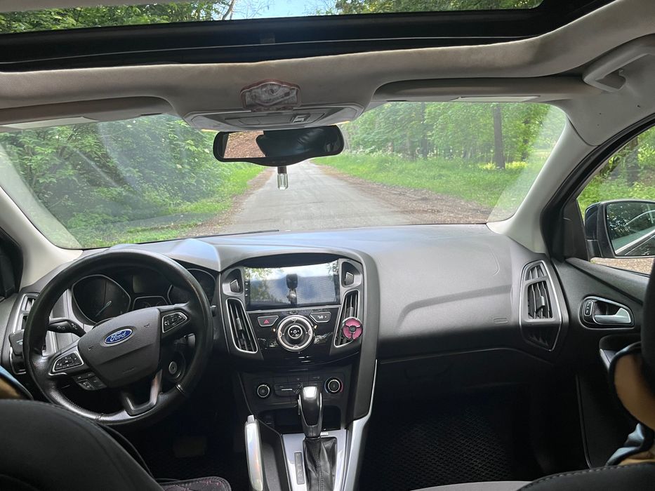 Ford Focus 2014 VIN 1FADP3F27FL203004 фото оголошення 9 з 12