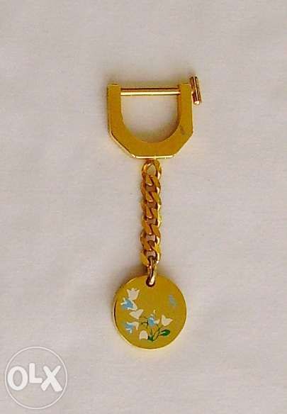 Porta Chaves dourado com flores