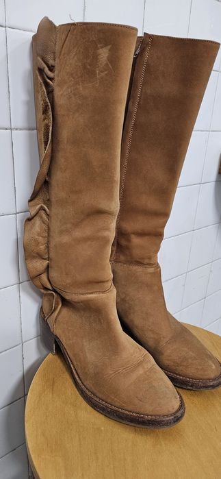 Bota Alta em Pele Mulher