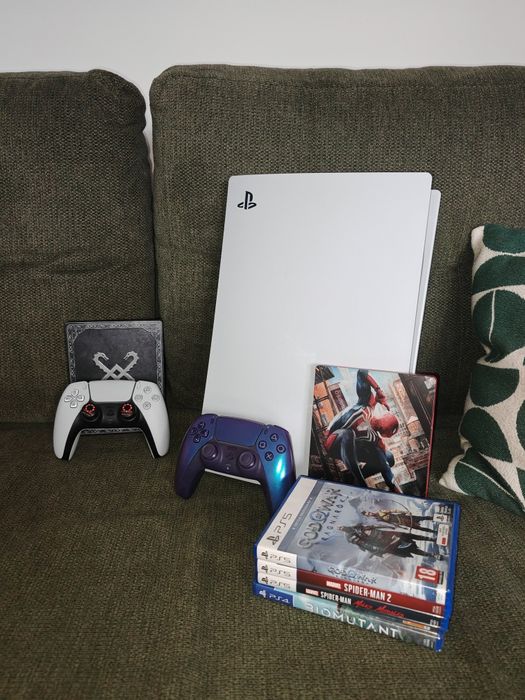 PlayStation 5 + 2 pady + gry