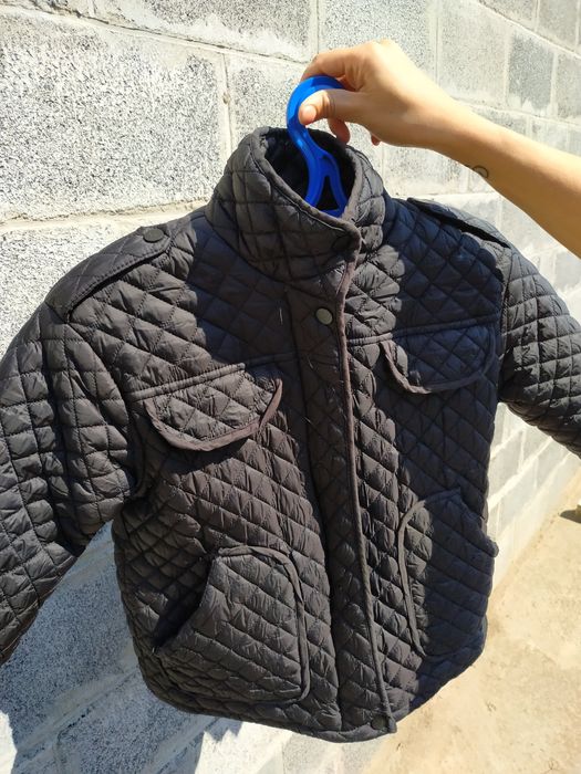 Стёганая черная куртка