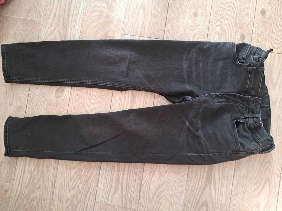 Czarne jeansy 152