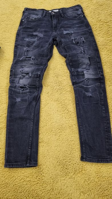 Spodnie jeansowe Cropp