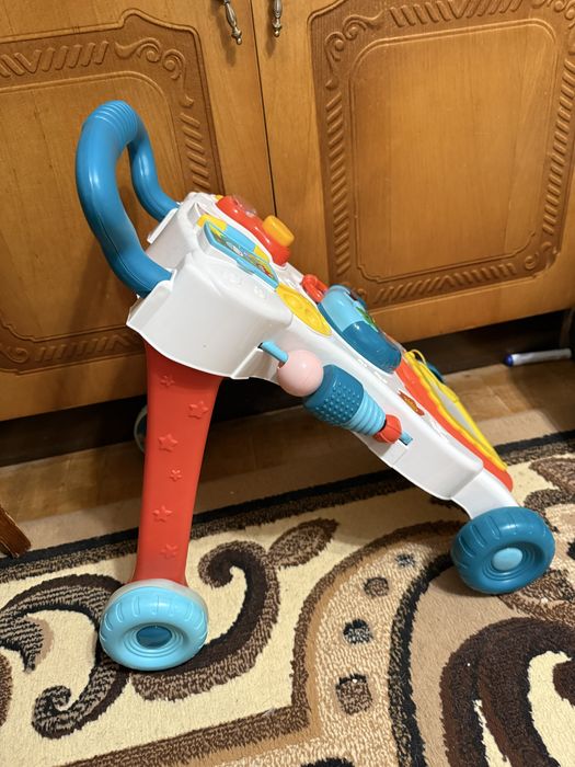 Каталка толокар з іграшками