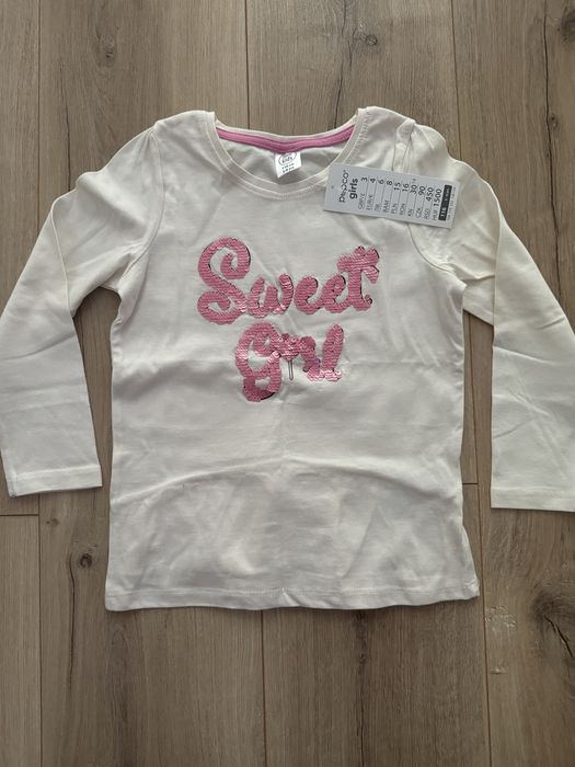 Zestaw nowych ubranek dla dziewczynki