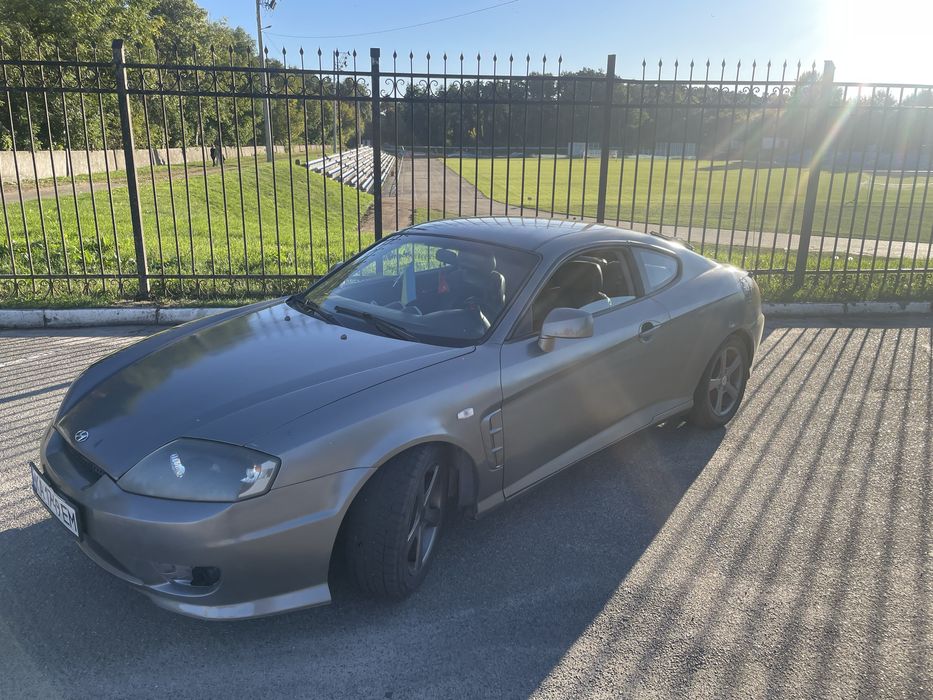 Hyundai Coupe 2006 VIN KMHHN61FP6U213796 фото оголошення 12 з 19