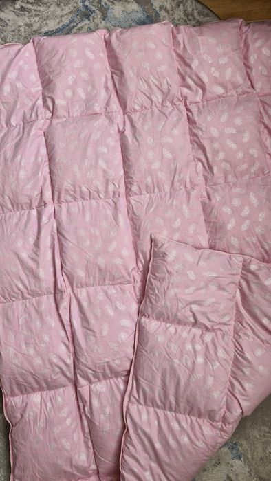 Новенька пір'яна ковдра-перина