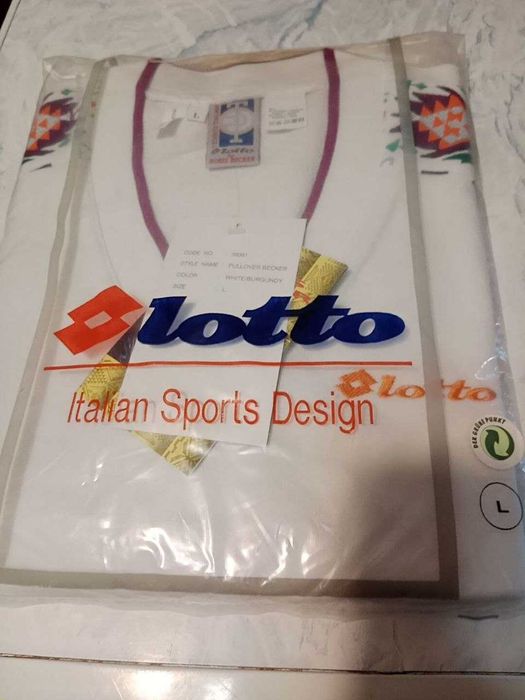 Мужской джемпер-безрукавка фирмы "Lotto". Новый.