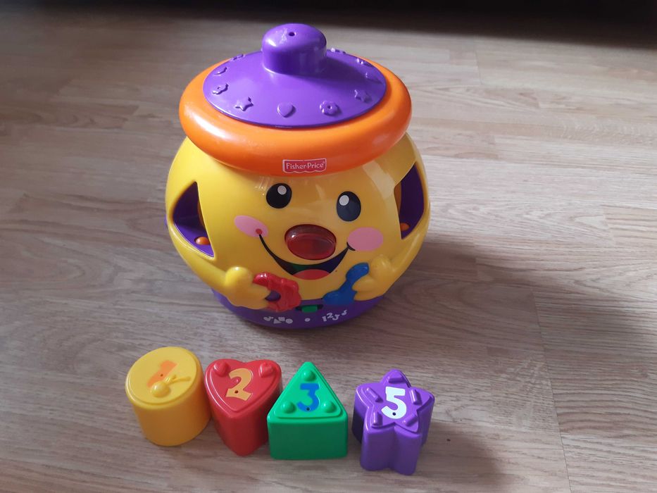 Garnuszek Fisher Price