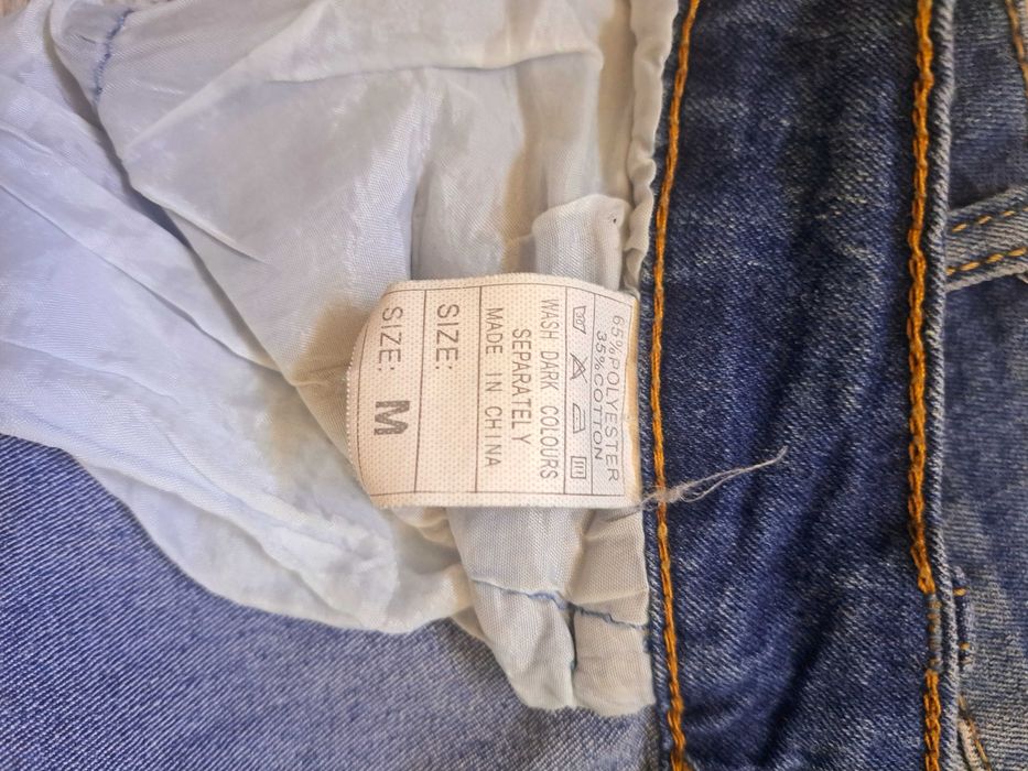 Spodnie jeansowe M zdobione haftowane kwiatki