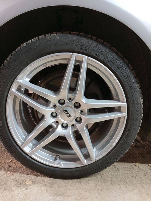 Felgi 5×112 18 cali z oponami Continental