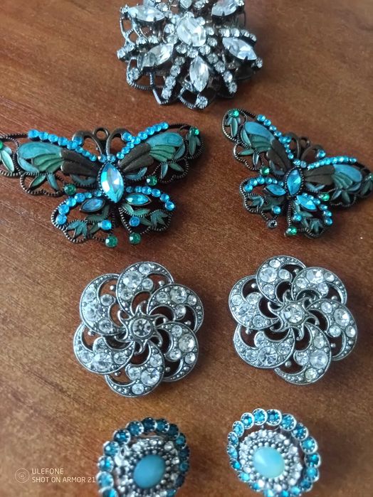 Антикварні брошки