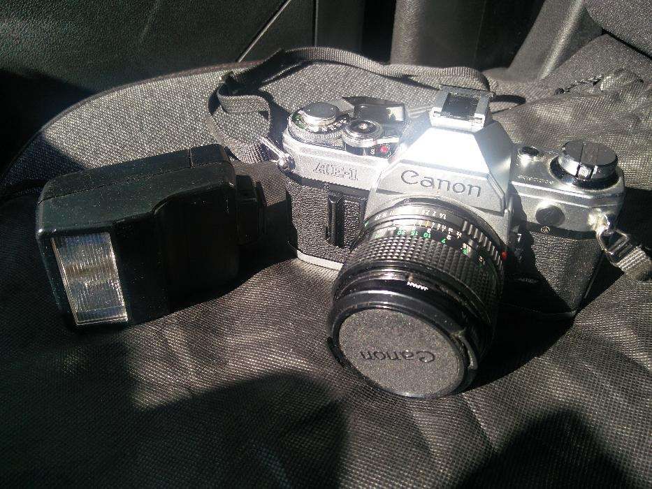 Maquina fotográfica Canon ae 1 + flash Ajuda • OLX Portugal
