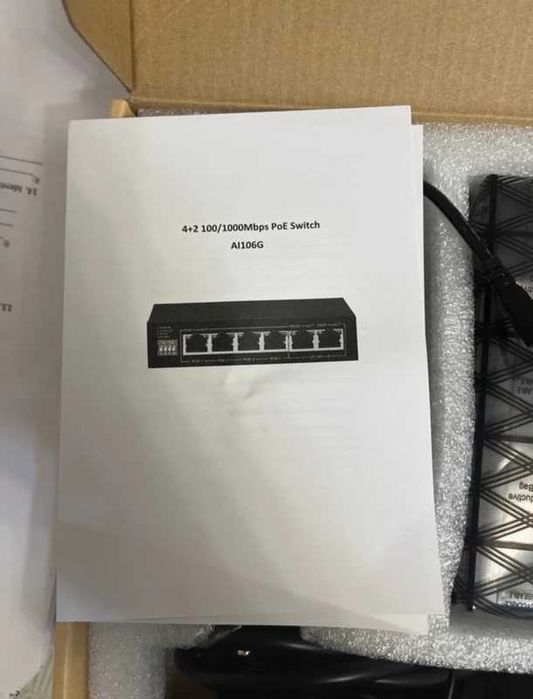 switch PoE Gigabit inteligente de 6 portas (4 PoE + 2 Uplink)