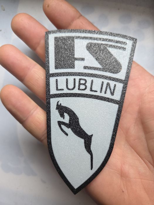 Emblemat Zuk zrobiony w technologii druku 3D. Różne warianty (opis)