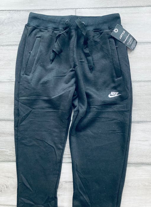 Nowe spodnie dresowe Nike M