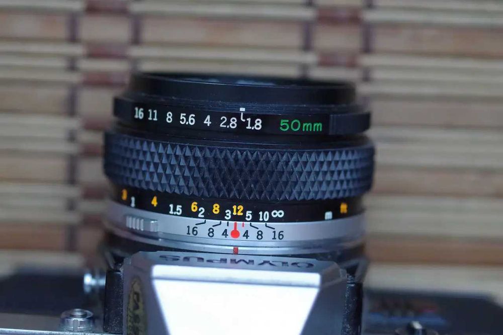 Фотоаппарат Olympus om-10 + Olympus OM Zuiko 50 mm 1.8 с ремнем